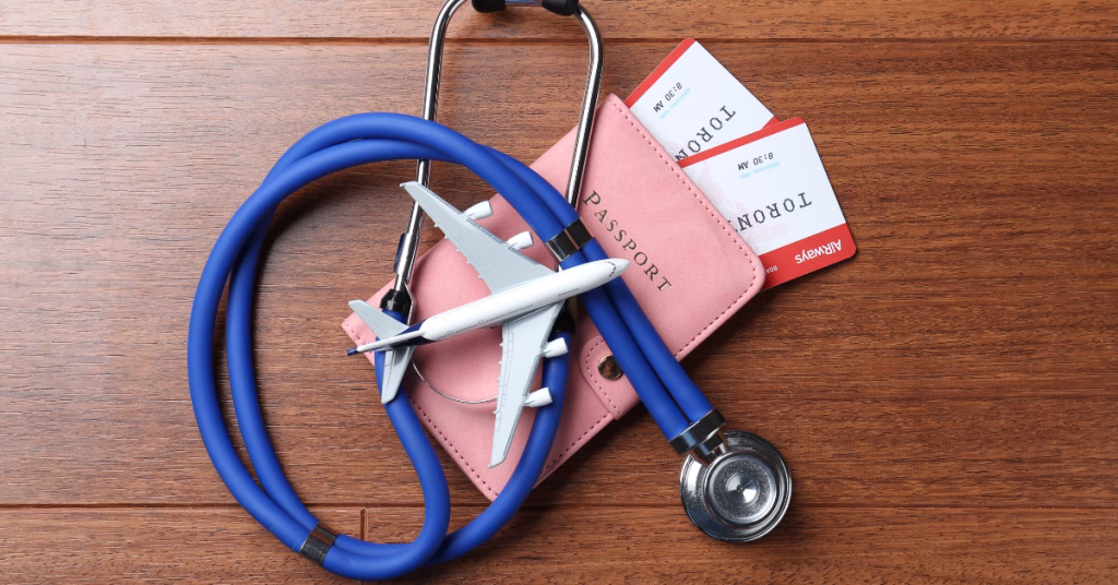 a flat lay photo of a blue stethoscope, an airplane figure, and a pink passport with plane tickets