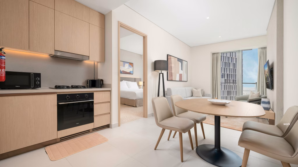 a photo of a serviced apartment in singapore with a kitchen